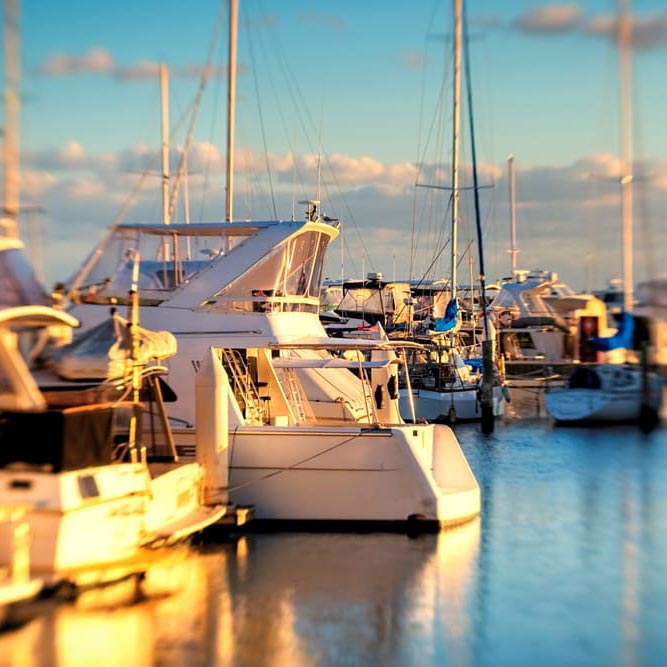 The White Color Luxury Boat in Willington Marina at Sunset in Southern California