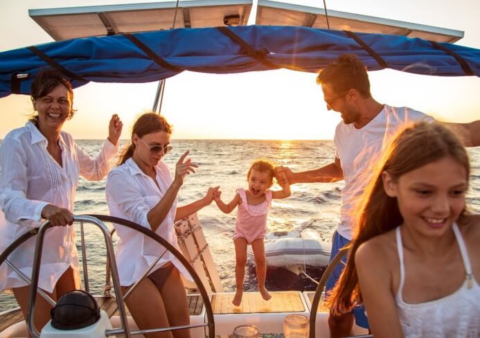 A family sailing in a marina bought from california yacht marina in Southern California