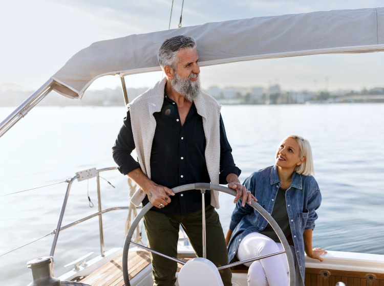 A Couple Sailing a Yacht in Winter - California Yacht Marina